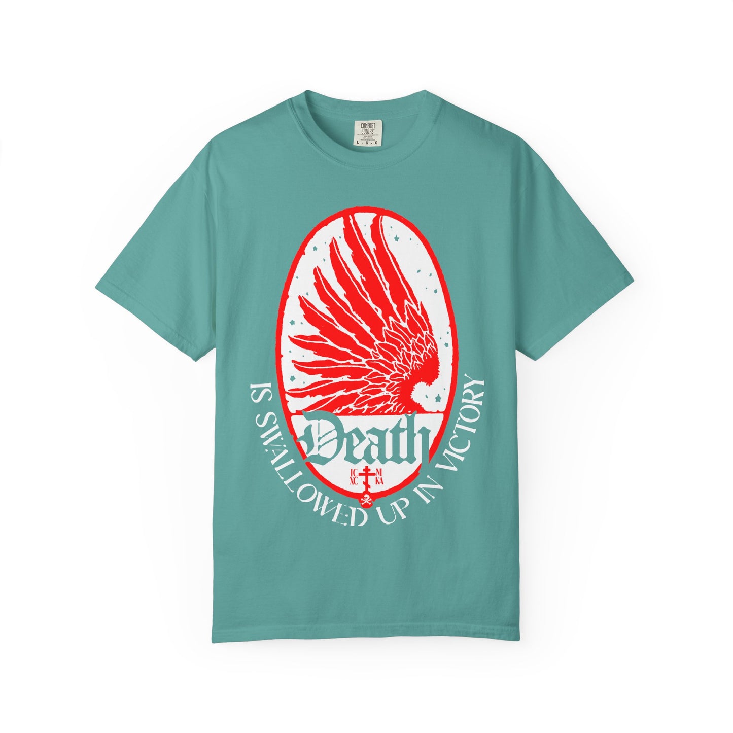 Seafoam heavyweight cotton unisex tee featuring an Art Nouveau eagle wing and stars design with the text “Death is Swallowed Up In Victory (1 Cor 15:54)” on the front, symbolizing immortality and victory over death in Orthodox Christian tradition.