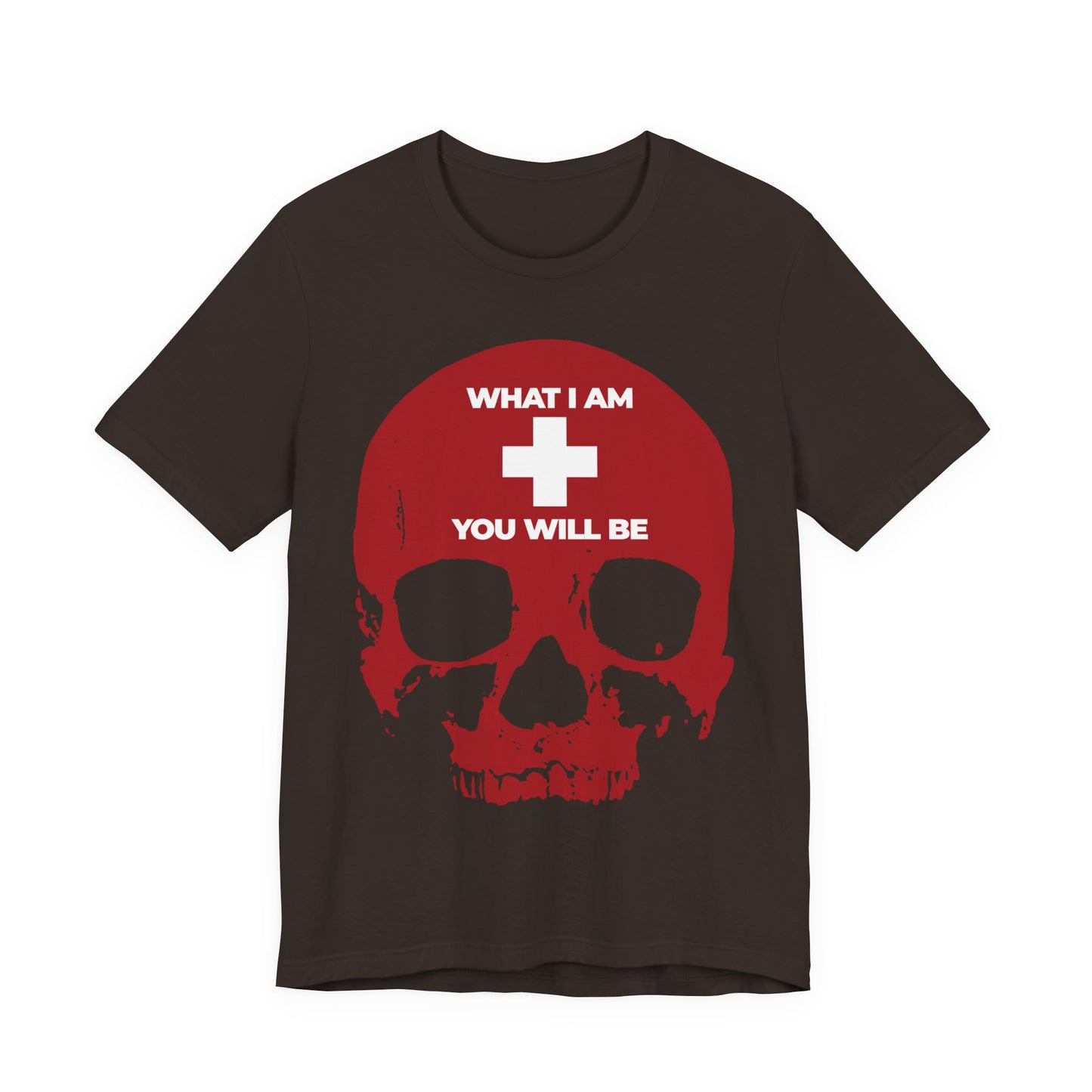Brown T-shirt featuring a white cross over a red skull, inspired by Ecclesiastes and the words of the wise; it displays the phrase: WHAT I AM YOU WILL BE, serving as a somber Preacher-style memento mori reminder.