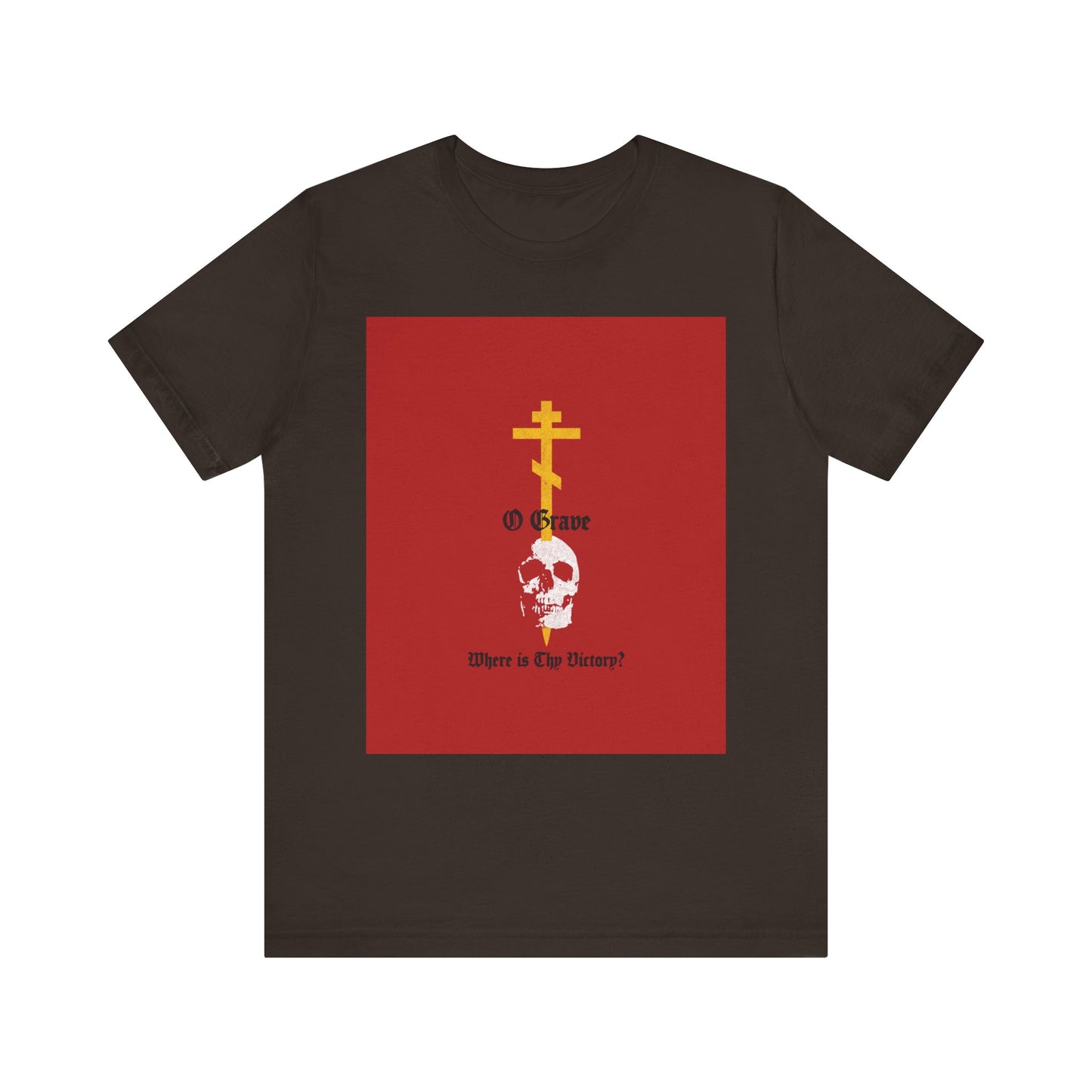 Brown t-shirt featuring a gold Orthodox cross piercing a white skull and the text: O Grave, Where is thy Victory?—a bold Christian design inspired by 1 Corinthians 15:55, symbolizing resurrection and immortality.