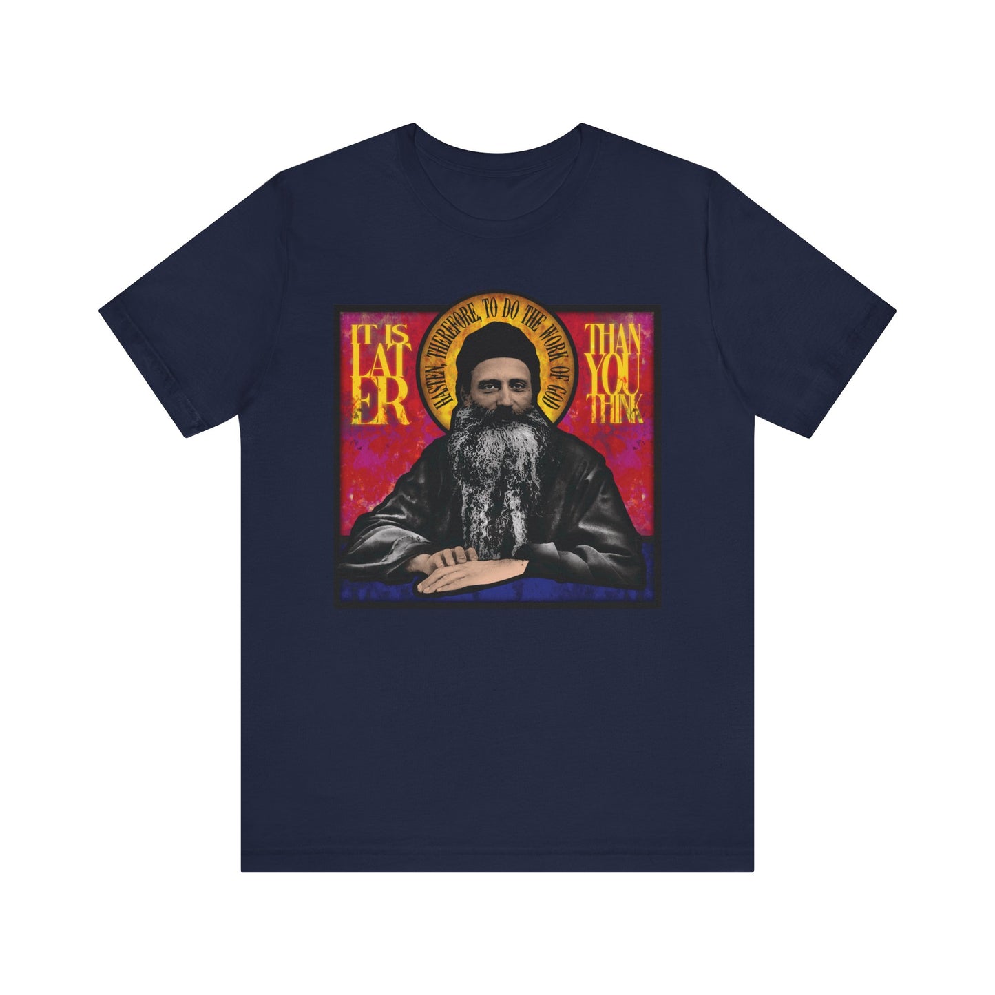 Navy t-shirt featuring a stained glass design of Fr. Seraphim Rose and the phrase "It Is Later Than You Think"—a lightweight, unisex cotton shirt inspired by the American Orthodox monastic saint.