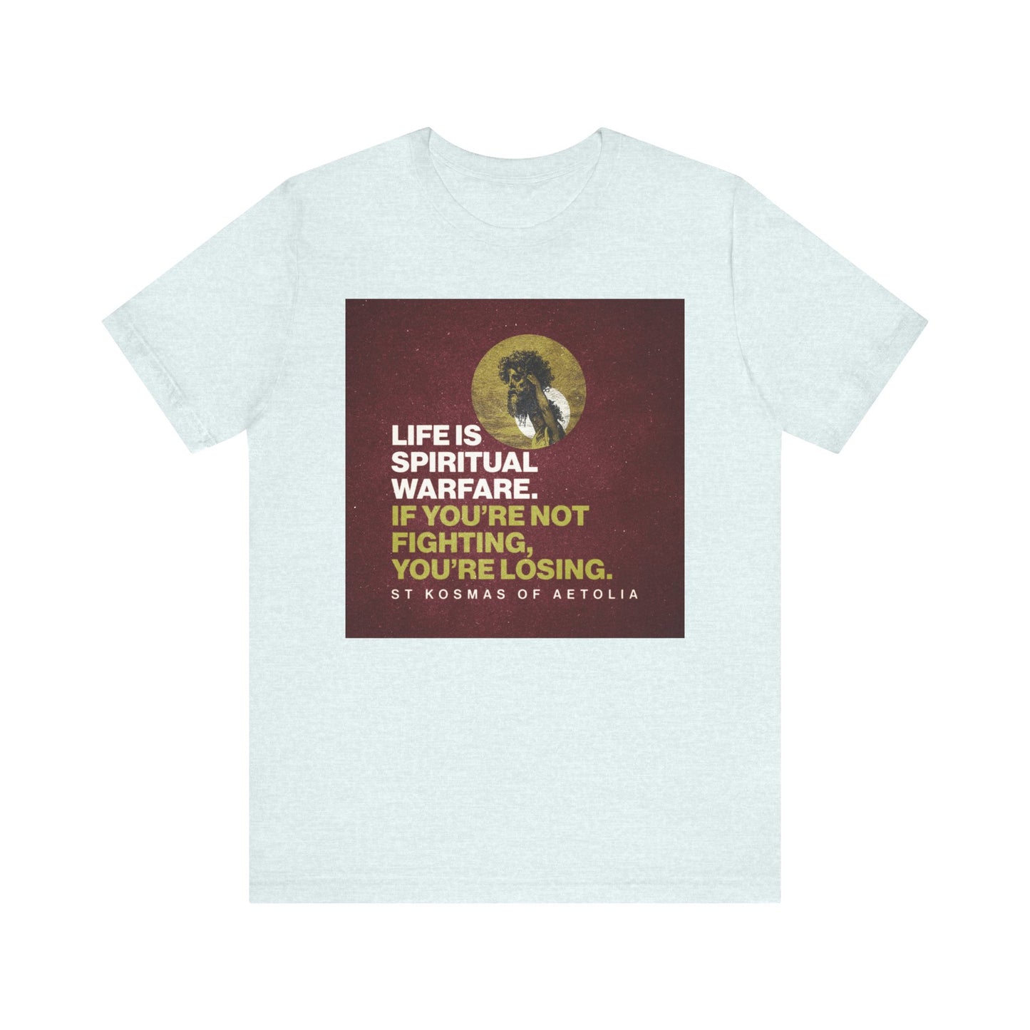 Stay vigilant in your daily battles with our "Life is Spiritual Warfare. If You're Not Fighting, You're Losing" Orthodox Christian Unisex Tee. Featuring a David Slaying Goliath design and inspired by the resilience of saints like St Kosmas of Aetolia, this lightweight cotton shirt in Heather Ice Blue is a powerful reminder to keep fighting.