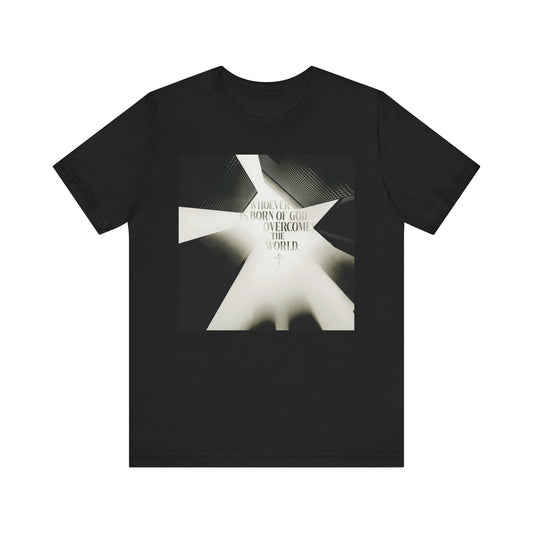 Certainly! Here’s a rewritten sentence using your product data: Black "Whoever is Born of God Overcomes the World (St John the Theologian)" Orthodox Christian lightweight cotton unisex t-shirt featuring a modern cityscape design, inspired by 1 John 5:1–4 and affirming Jesus as the Christ.