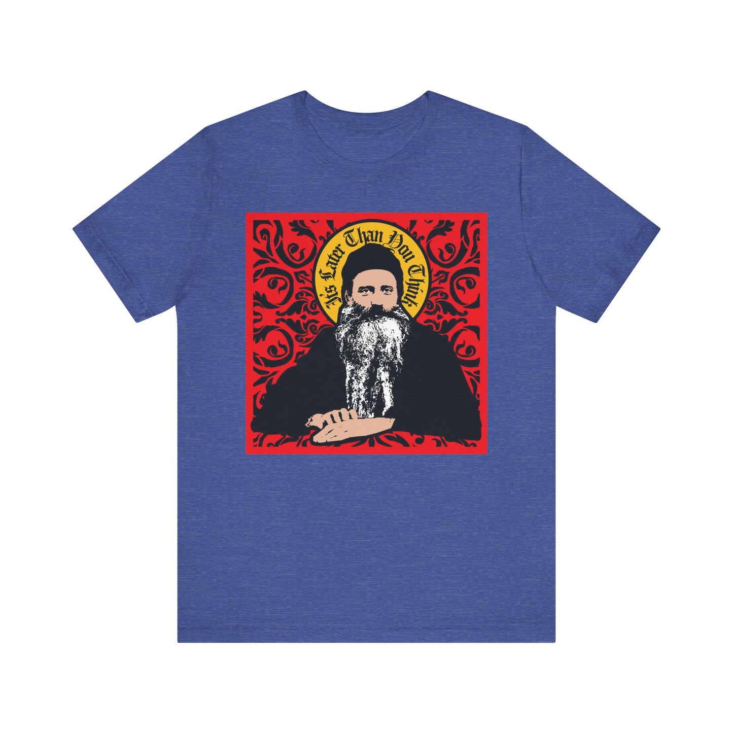 Heather True Royal unisex tee featuring a red ornate icono-graphic design of Saint Seraphim Rose with text above, made from lightweight cotton.