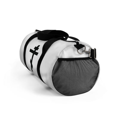 White cylindrical duffle bag with black straps, mesh end pocket, and black Orthodox Cross graphic featuring Gal 6:14: "May I never boast, except in the cross of our Lord Jesus Christ." Perfect for Orthodox Christians.
