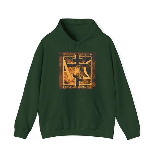 Forest green hoodie with a brown and orange Orthodox cross, Alpha & Omega design, and "I MAKE ALL THINGS NEW"—inspired by Rev 21:5 and the promise of a new heaven and earth.