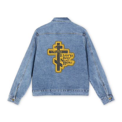 Medium denim wash jean jacket with a yellow cross and “Every Knee Shall Bow” from Philippians 2:10-11 on the back; features distressed 70s halftone comic book aesthetic and Isaiah 45:23. Orthodox Christian design.