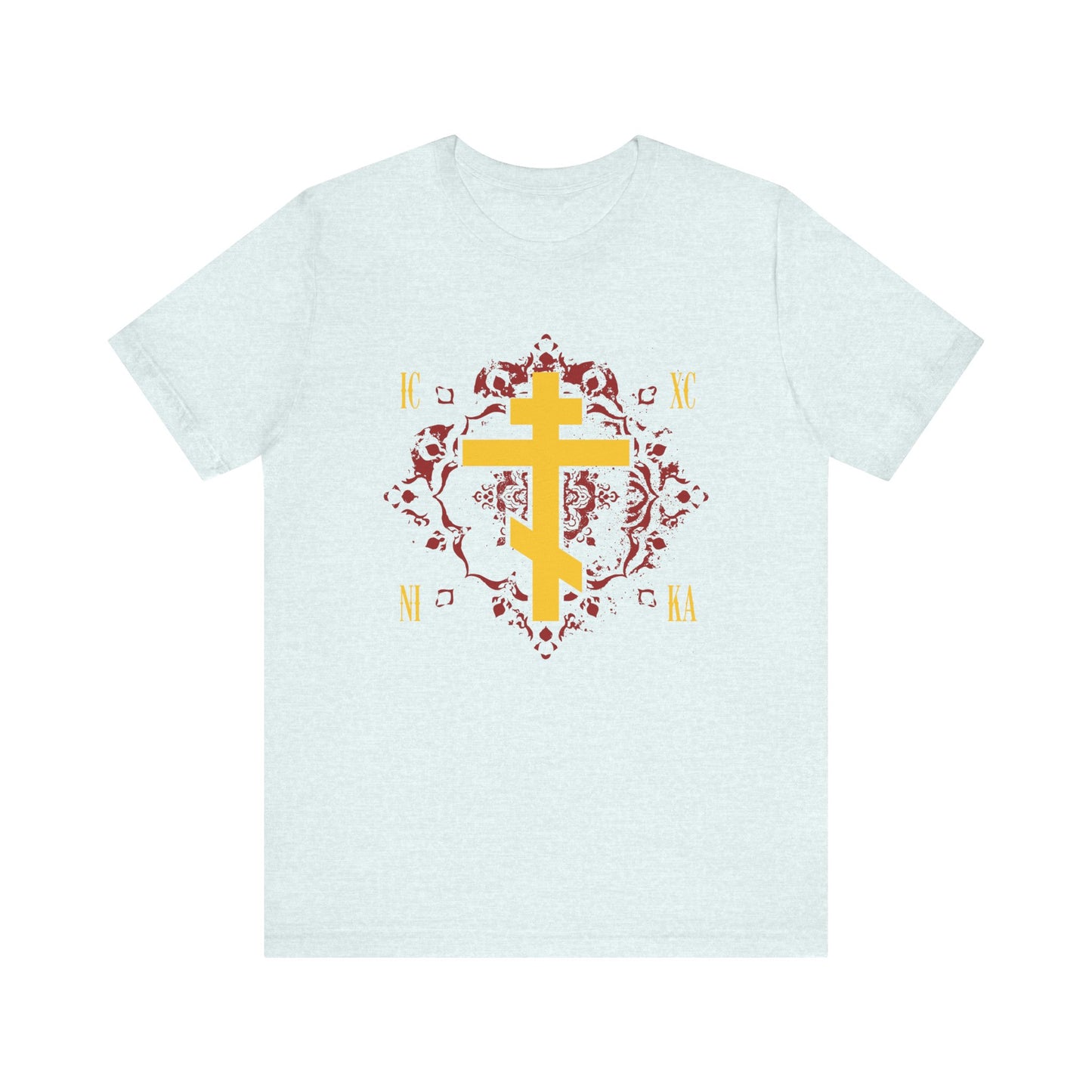 Heather ice blue unisex t-shirt featuring a yellow Orthodox Cross with the inscription IC XC NI KA in gold on an ornate red background—celebrating Jesus Christ Conquers and honoring St. Kosmas Aitolos and the grace of sonship.