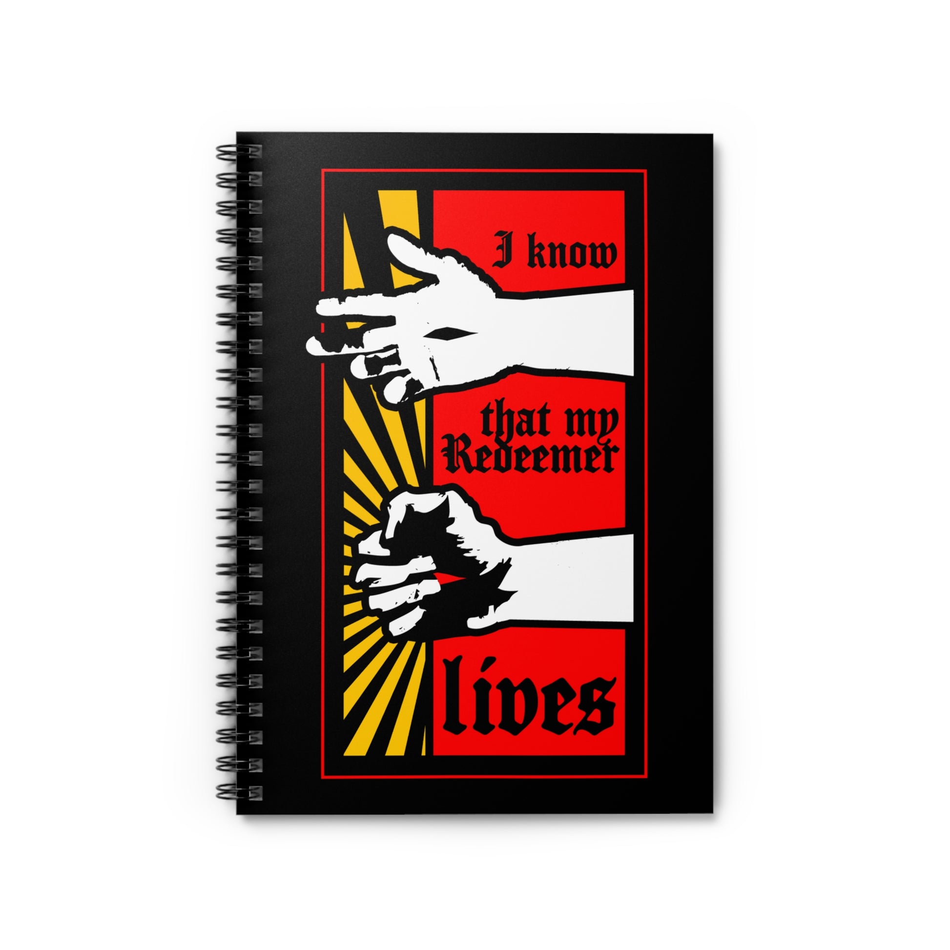 A black spiral notebook titled "I Know That My Redeemer Lives (Job 19:25)" features a comic book style design of resurrected Jesus’ fist with divine power, in bold red, yellow, and white art.