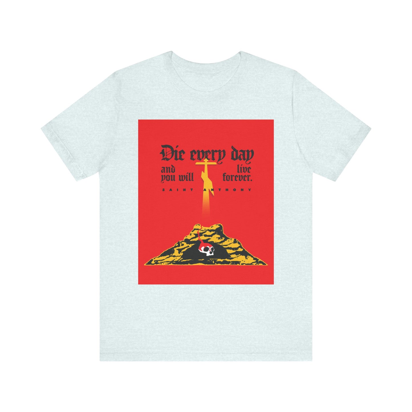 Heather Ice Blue tee featuring a red Golgotha Cross and Skull of Adam design with "Die Every Day and You Will Live Forever," inspired by St Anthony the Great. Lightweight cotton, unisex fit.