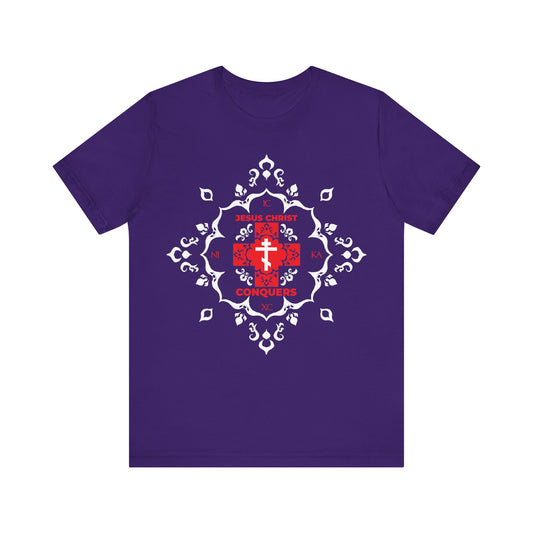 Team Purple "ICXC NIKA Means Jesus Christ Conquers" T-shirt features a white Orthodox cross, red modern font, and medieval filigree—symbolizing victory over sin and inspired by St. John Chrysostom’s teachings.