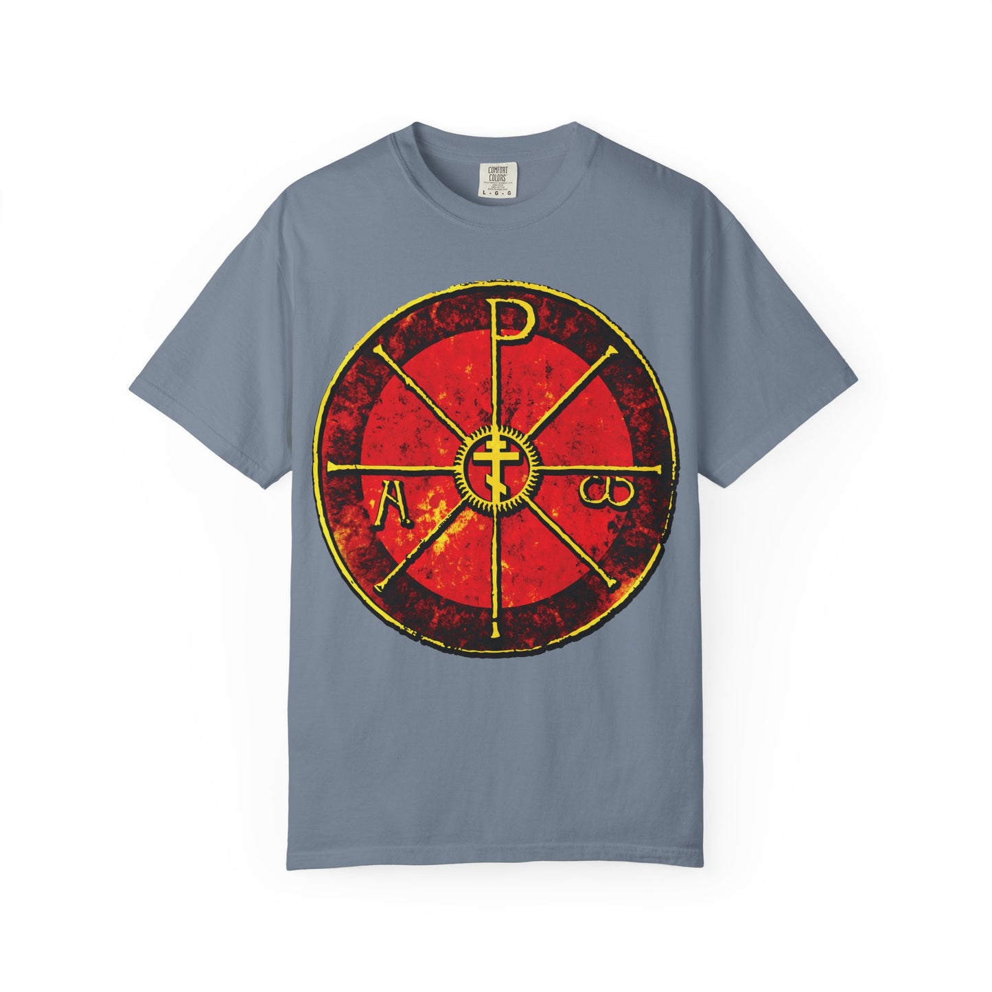Blue Jean T-shirt featuring a large red and yellow symbol inspired by the Chrismon of Saint Ambrose with Greek letters and a central cross—an homage to Milan’s Duomo. Alpha & Omega Chi Rho Orthodox Cross, heavyweight cotton.