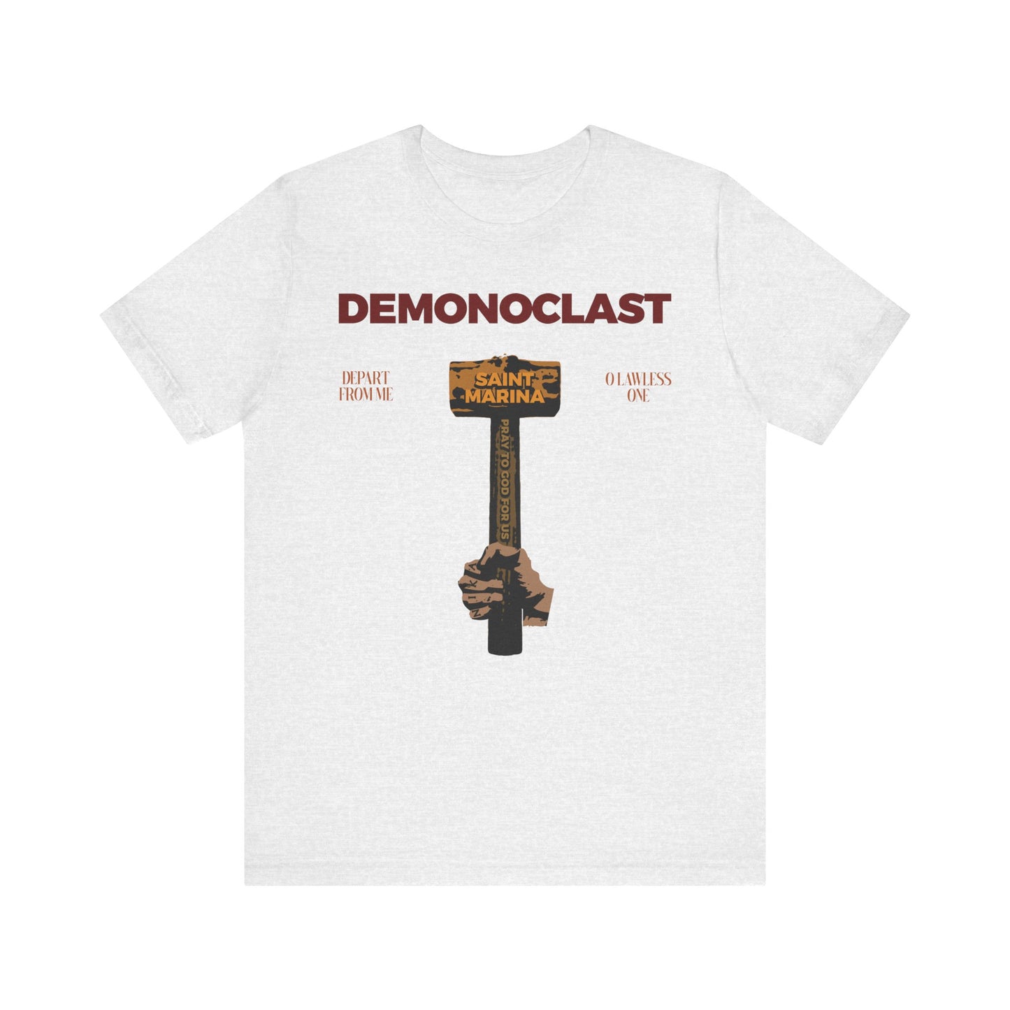 Ash t-shirt with DEMONOCLAST text and two hands holding St. Marina's Hammer, inspired by her martyrdom. Features "NIKA Fist," "Christ Conquers," and "Unseen Warfare." Lightweight cotton unisex tee.