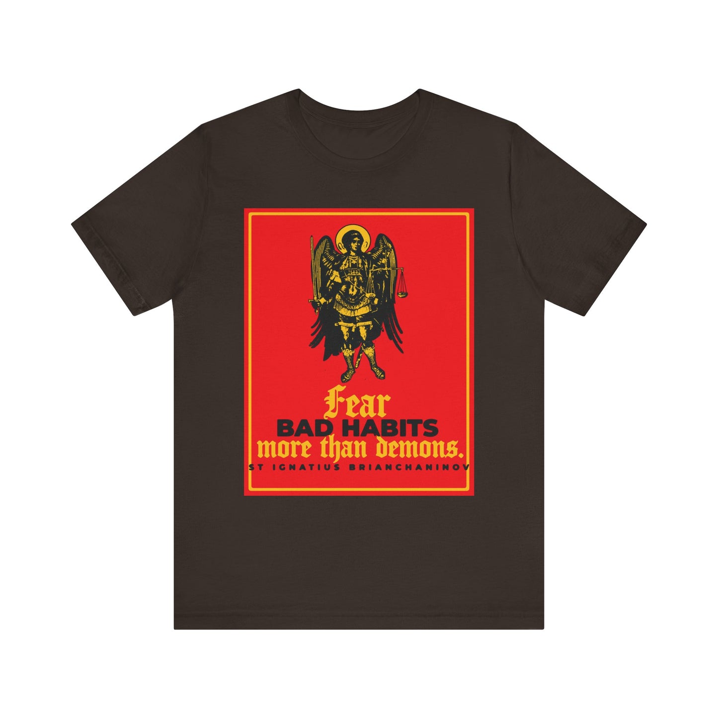 Brown unisex tee featuring St Ignatius Brianchaninov’s quote—“Fear bad habits more than demons”—with an Archangel Michael iconographic design. A powerful Orthodox reminder for spiritual vigilance. Lightweight cotton.
