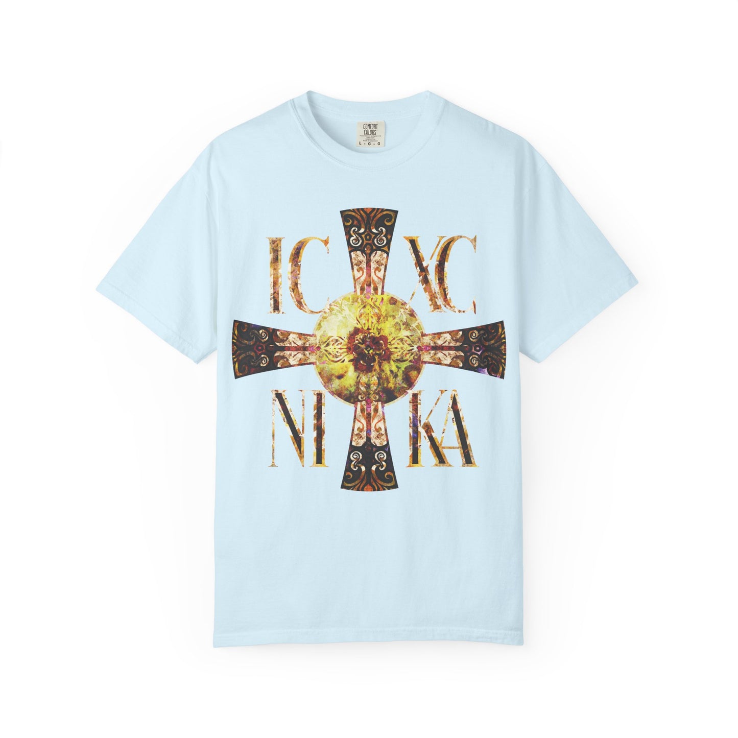 Chambray-colored heavyweight cotton unisex tee featuring a large ornate Celtic-style equal-armed Cross with the letters IC XC NIKA and a bright solar texture on the front, symbolizing victory under the never-setting Sun.