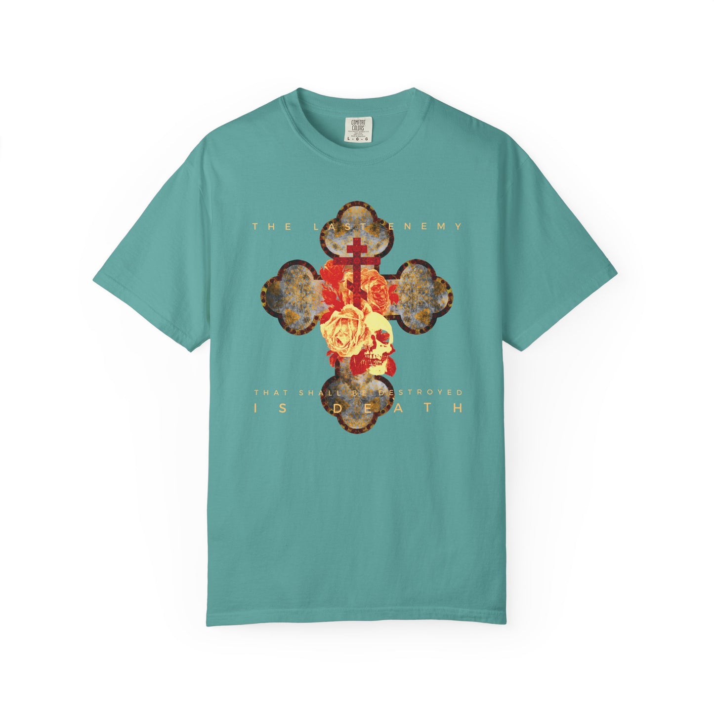Seafoam heavyweight cotton t-shirt featuring a metallic gothic cross with rose & skull, plus the words: The final enemy that shall be destroyed is death (1 Cor 15:26). Inspired by the promise of resurrection.