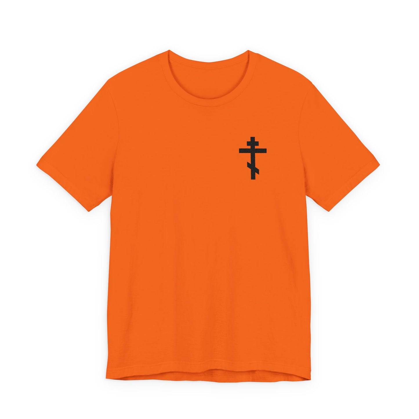 An orange t-shirt with a small black embroidered Orthodox cross on the left chest, featuring Galatians 6:14: "May I never boast, except in the cross of our Lord Jesus Christ.