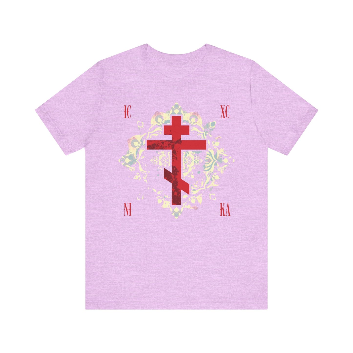 The ICXC NIKA lightweight unisex tee in Heather Prism Lilac features a textured red Orthodox cross and Greek letters over a medieval floral pattern, symbolizing Christ’s victory—Orthodox-inspired comfort in every wear.