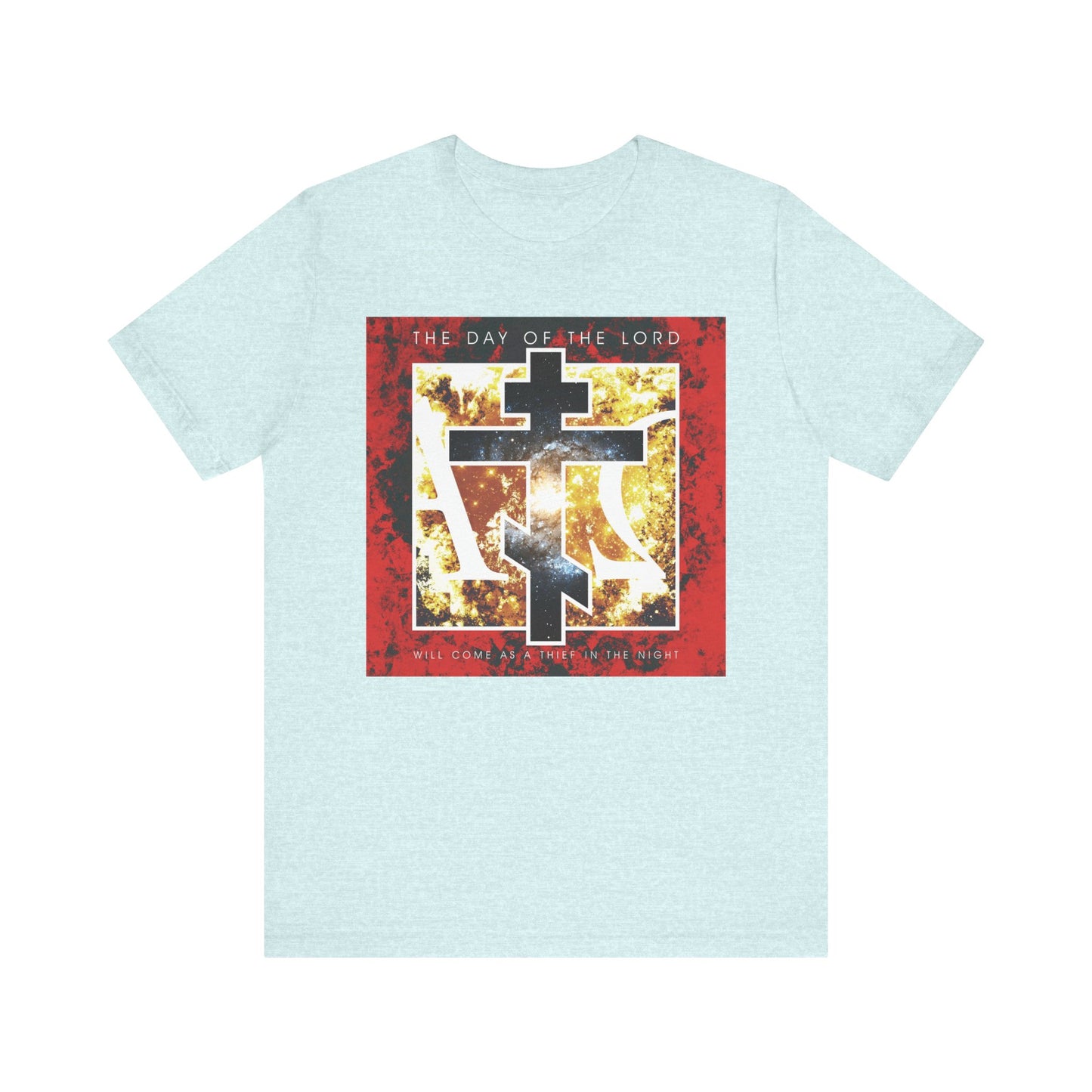 Heather Prism Ice Blue unisex cotton tee featuring a cosmic Alpha & Omega cross design with the text "The Day of the Lord Will Come as Thief in the Night," inspired by 1 Thessalonians and expressing hope for all children of light.