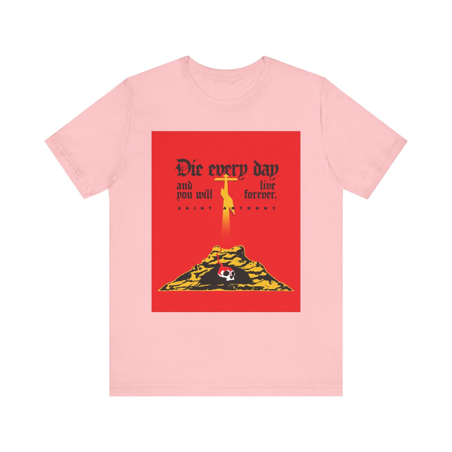 Pink "Die Every Day and You Will Live Forever" tee inspired by St Anthony the Great, featuring a red Golgotha Cross and Skull of Adam graphic on lightweight cotton. Unisex fit.