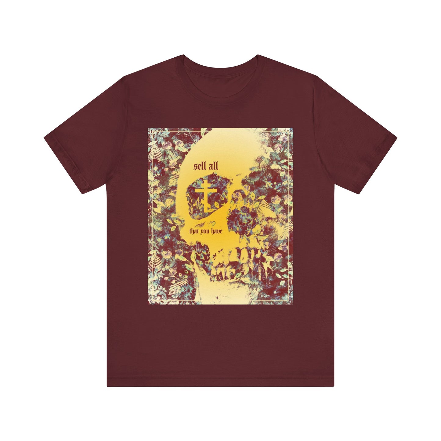 A maroon unisex tee featuring an Orthodox cross, yellow skull graphic, and floral textures, with bold "Sell All That You Have" text—a striking ascetic reminder to seek the kingdom of heaven.