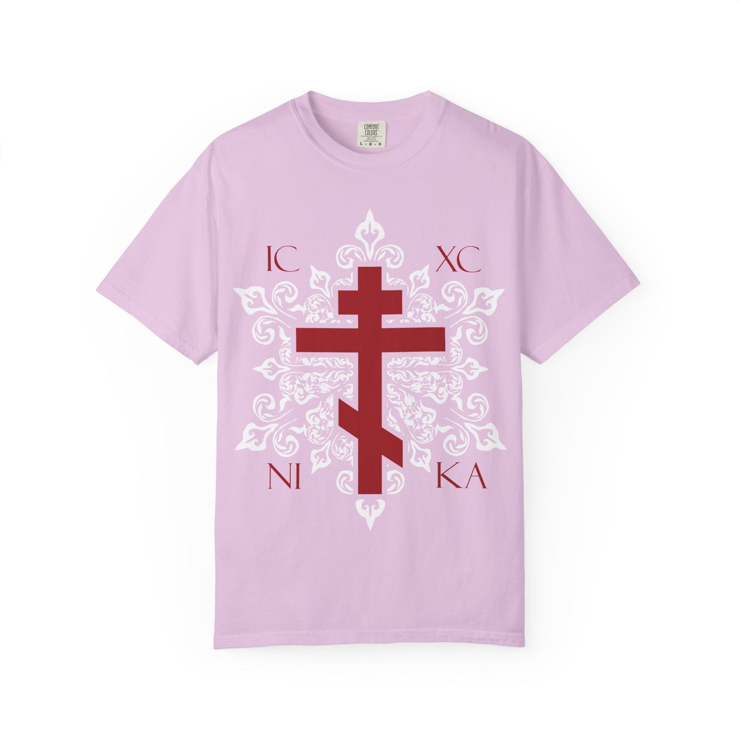 Orchid-colored heavyweight cotton unisex tee, featuring a red Orthodox cross and ornate white medieval floral design with the letters ICXC NI KA—our best-selling tribute to the Adoration at the Cross, inspired by spiritual themes from the Kontakia of St. Romanos and evoking a sense of Paradise.