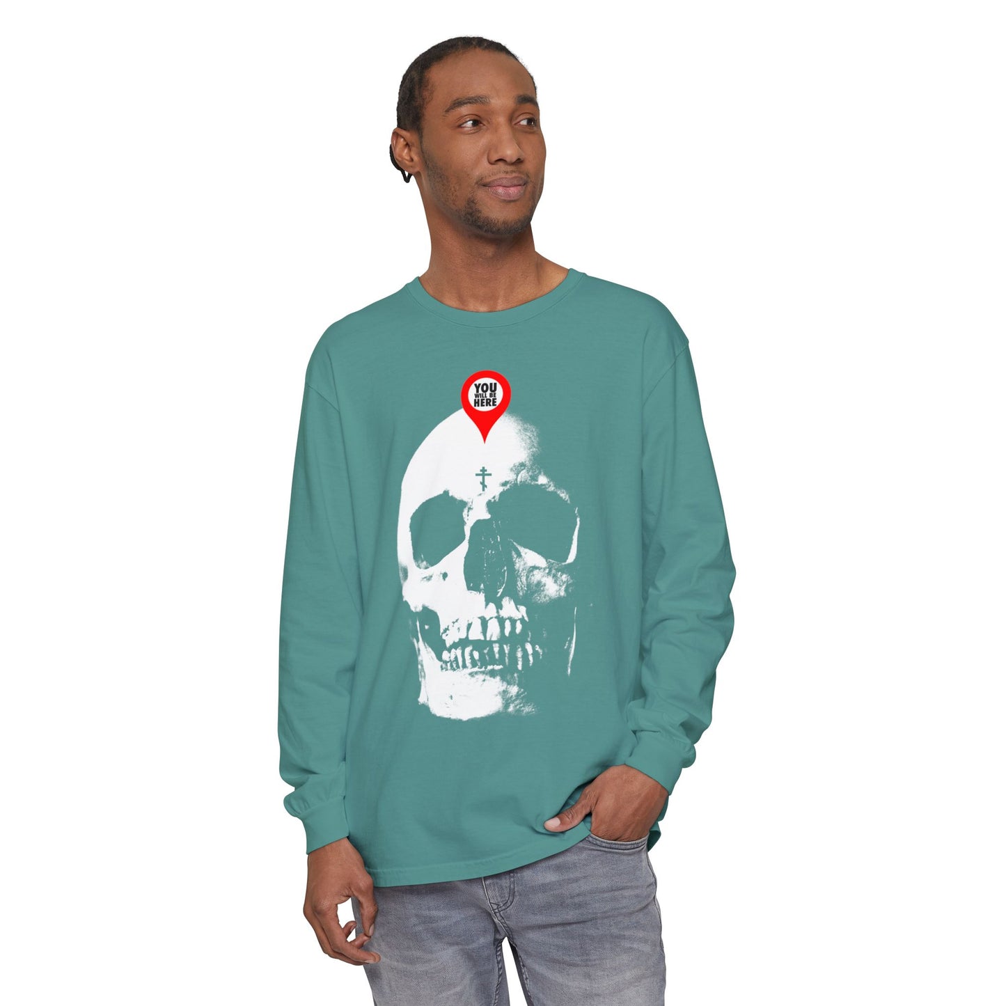 Man wears the You Will Be Here Maps Marker on Skull Design Orthodox Long Sleeve, featuring a bold memento mori skull graphic and red map pin, inspired by St. Ignatius Brianchaninov's teachings to remember you will die.