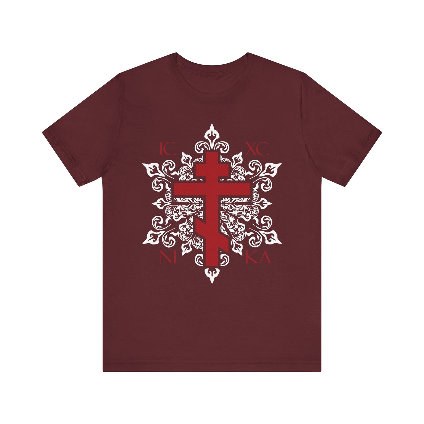 Maroon unisex t-shirt featuring a white ornate Orthodox cross with floral design and Greek letters ICXC NIKA—our best-selling lightweight cotton tee inspired by faith and tradition.
