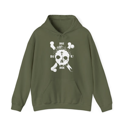 The Die Before You Die Hoodie features an olive green base, retro skull & crossbones, Orthodox cross, laurel victory wreath, and Memento Mori, reflecting ascetic Christian themes from Matthew 16:24-25.