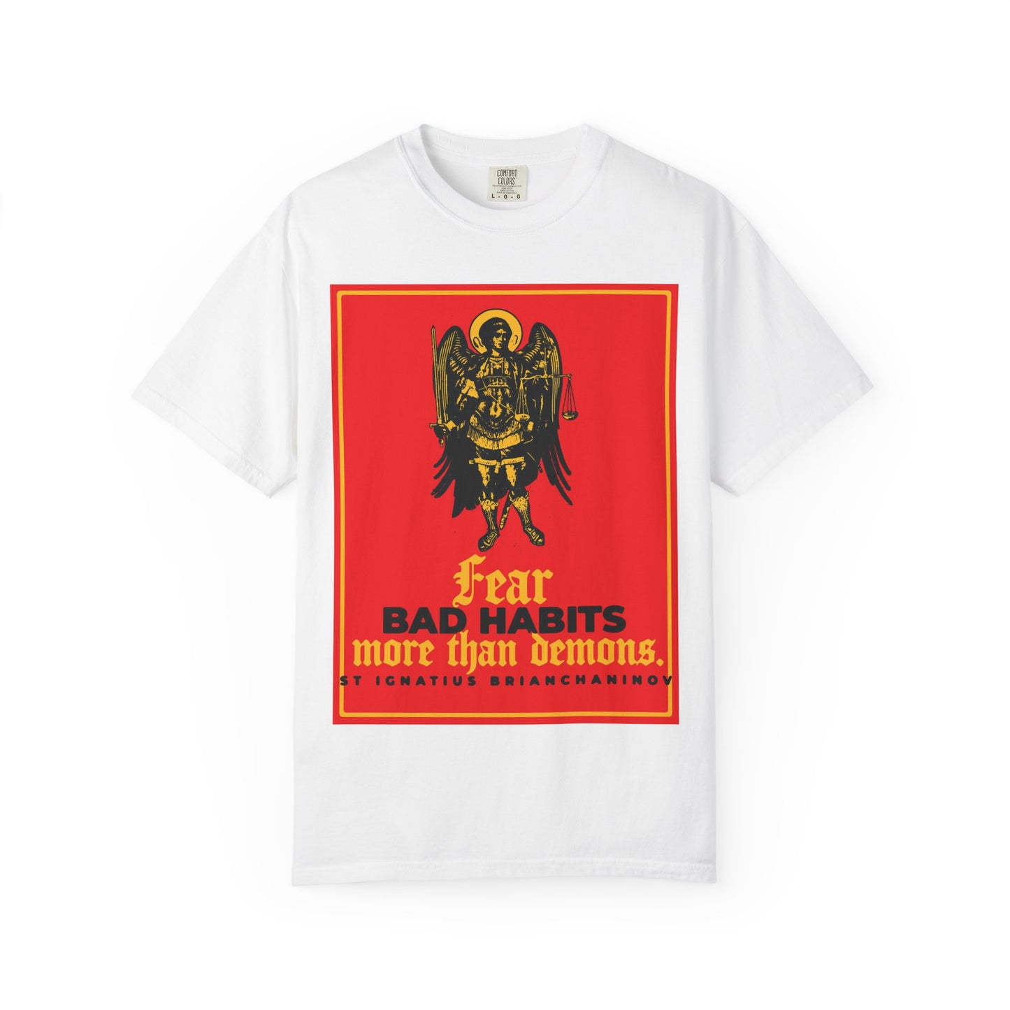 White heavyweight cotton unisex tee featuring a striking icono-graphic of Archangel Michael and the quote “Fear bad habits more than demons” by St. Ignatius Brianchaninov—a bold Orthodox reminder of our spiritual struggle for moral freedom.