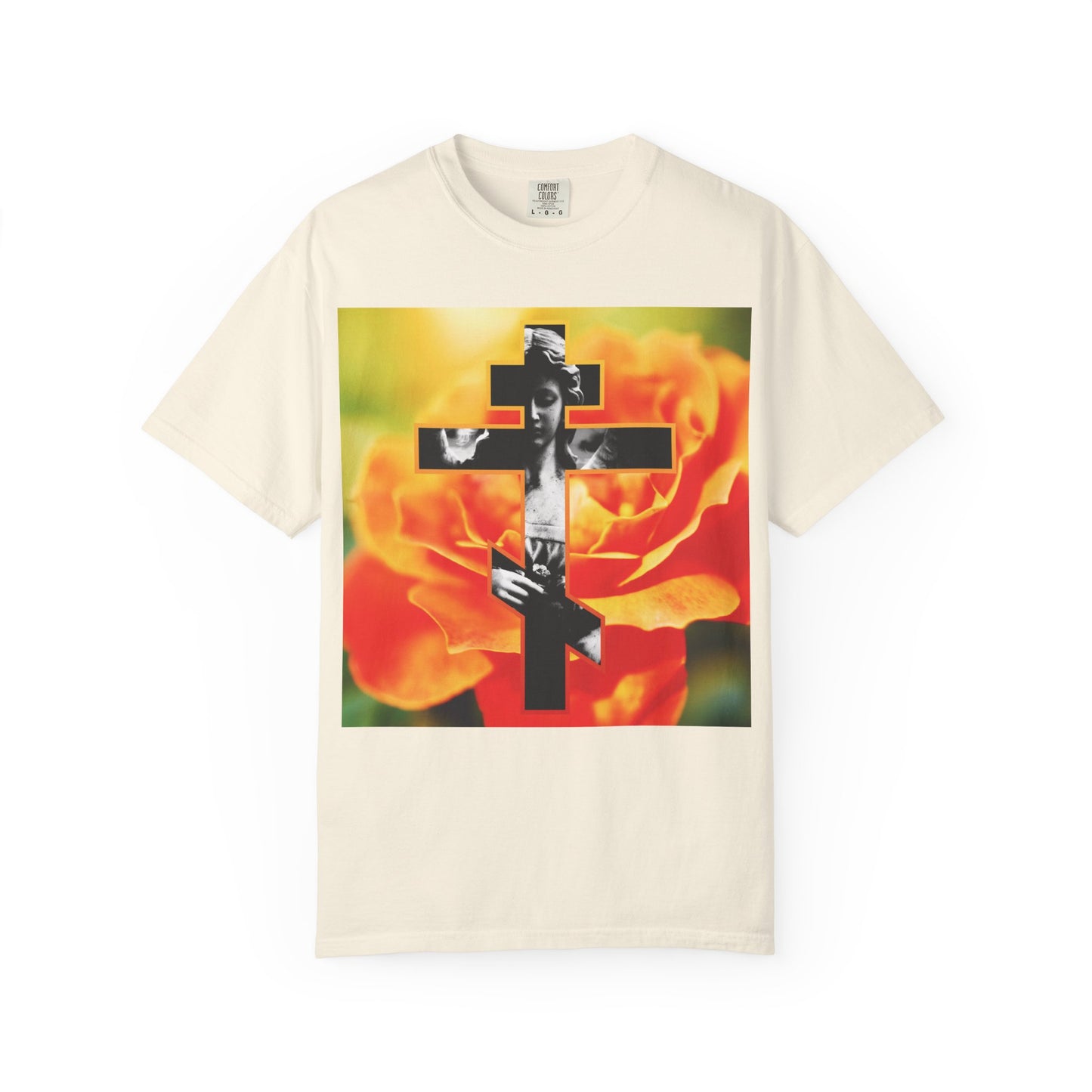 Ivory tee featuring the “Cemetery Statue Angel Cross on Orange Rose” graphic—a powerful Memento Mori design inspired by Orthodox Christian tradition and Galatians 6:14, highlighting an angelic cross and vibrant orange rose as a modern tribute.