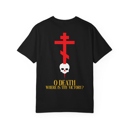 Black heavyweight cotton unisex tee featuring a red cross on the front left chest and an eye-catching design of a cross stabbing a skull with yellow text on the back: “O DEATH WHERE IS THY VICTORY?”—a bold Resurrection-inspired statement.