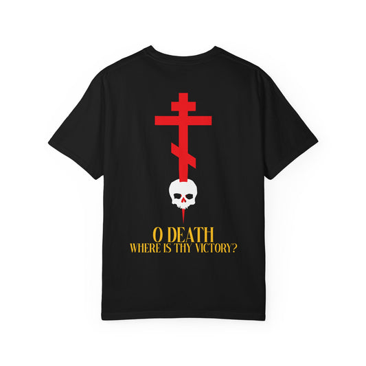 Black heavyweight cotton unisex tee featuring a red cross on the front left chest and an eye-catching design of a cross stabbing a skull with yellow text on the back: “O DEATH WHERE IS THY VICTORY?”—a bold Resurrection-inspired statement.