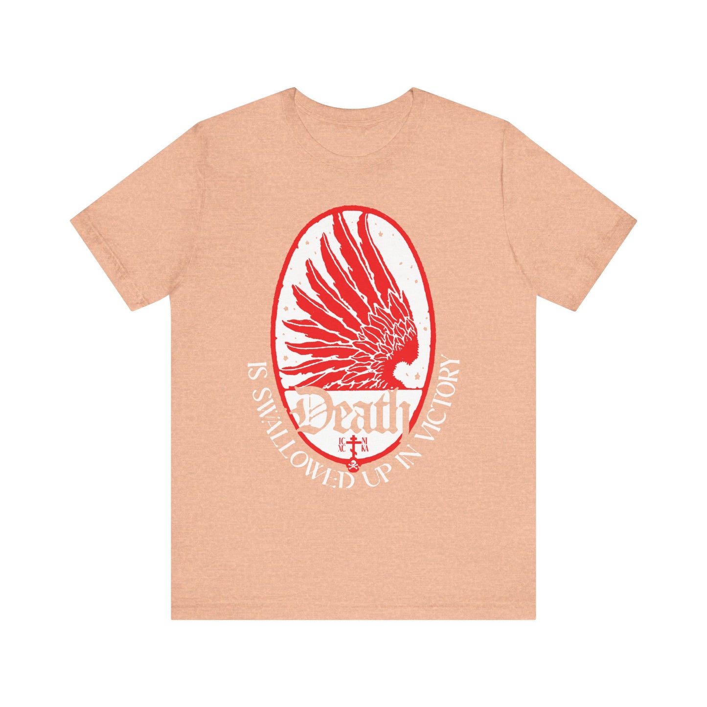 Heather peach unisex tee featuring an Art Nouveau eagle wing and stars, with "Death is Swallowed Up In Victory" (1 Cor 15:54) in white text—symbolizing freedom from death. Lightweight cotton; Orthodox Christian design.