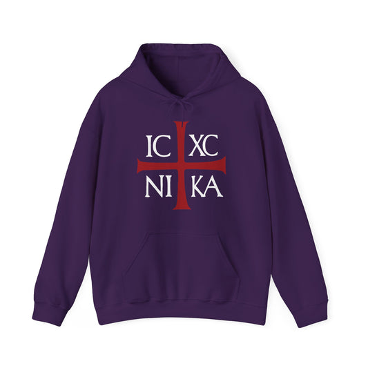 Purple "ICXC NIKA Means Jesus Christ Conquers" hoodie featuring a red Orthodox cross and white ancient Byzantine Christogram, inspired by Romans 8:31-39 and the enduring love of Christ for God’s elect.