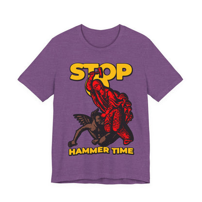 Purple unisex tee featuring St Marina of Antioch beating the devil with a hammer, comic style. "STOP, HAMMER TIME" text; red, blue & yellow modern Orthodox meme design inspired by the legendary Christian saint.