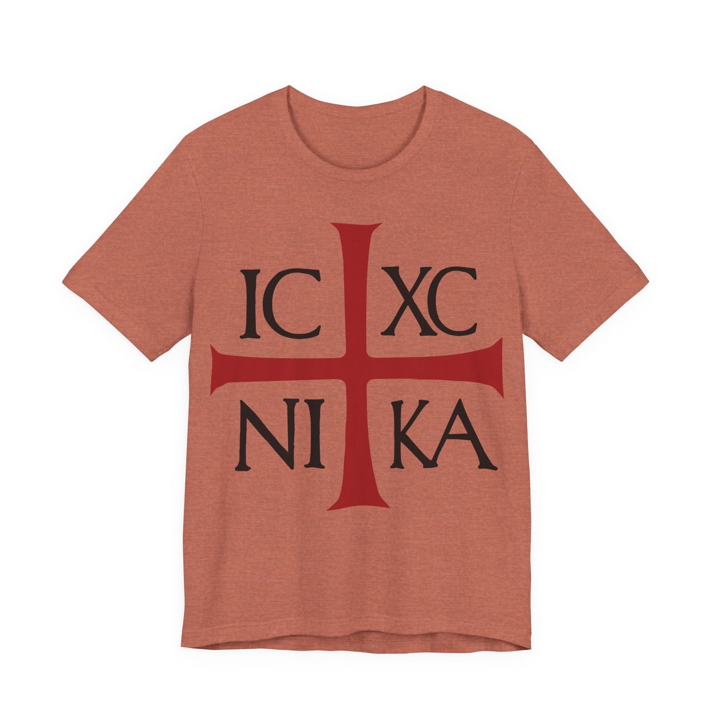 Heather Clay "ICXC NIKA Means Jesus Christ Conquers" Orthodox Christian T-shirt featuring a bold red cross with black IC XC NI KA text, inspired by the ancient Byzantine Christogram and Philippians 2:9-11.