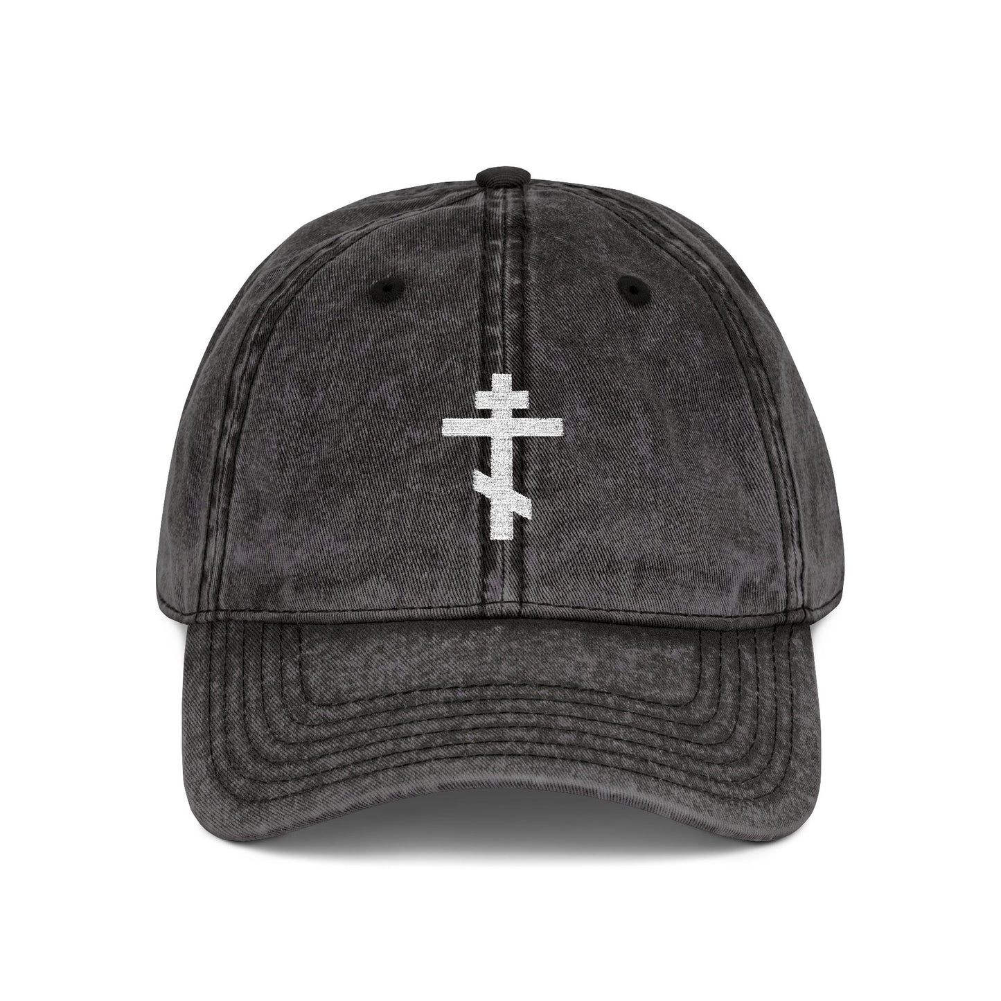 A black distressed cap featuring a simple white Orthodox TriBar Cross and "Crucify My Ego to the Precious and Life Giving Cross" embroidered, combining minimalist Christian style with deep symbolism.
