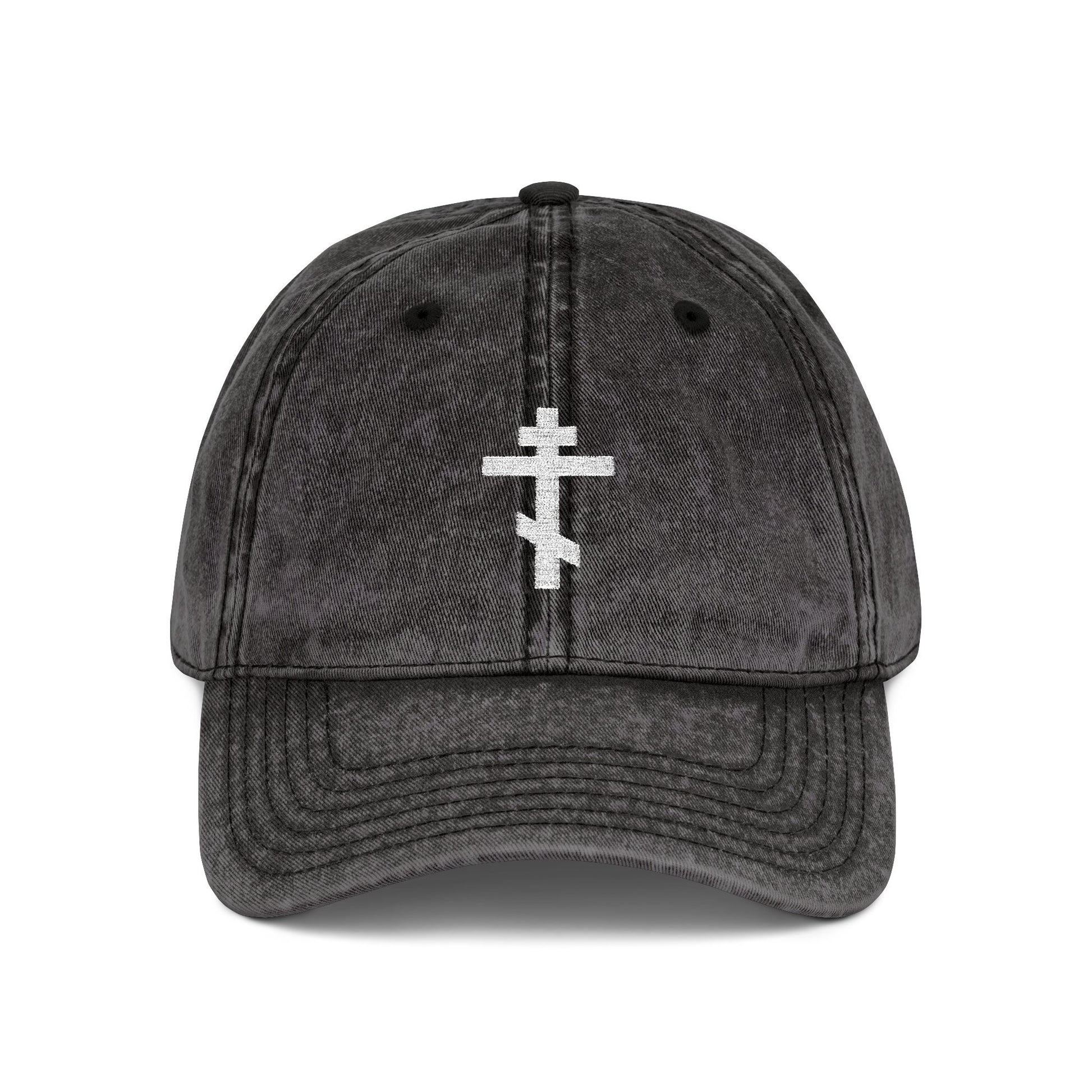 A black distressed cap featuring a simple white Orthodox TriBar Cross and "Crucify My Ego to the Precious and Life Giving Cross" embroidered, combining minimalist Christian style with deep symbolism.