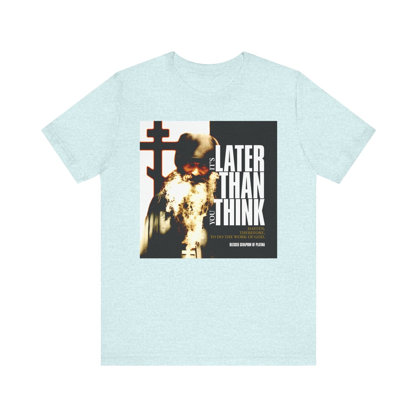Heather Prism Ice Blue unisex cotton t-shirt featuring St Seraphim Rose’s photo with modern cinematic poster typography and the phrase “It’s Later Than You Think.” Inspired by Orthodox teachings.