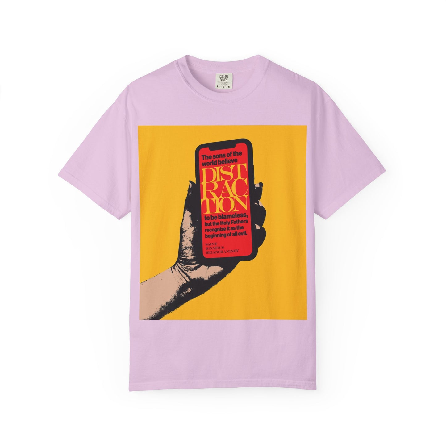 Orchid-colored heavyweight cotton unisex tee featuring artwork of a hand holding a phone with bold text on the screen, set against a vibrant yellow background. The phrase “The Field,” inspired by the writings of St Ignatius Brianchaninov and other Holy Fathers, is elegantly incorporated into the design. Product name: Distraction is the Beginning of All Evil (St Ignatius Brianchaninov) | Mobile Phone Addiction | Orthodox Christian Heavyweight Cotton Unisex Tee.