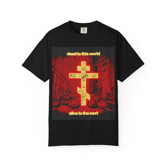 Black heavyweight cotton unisex tee featuring a glowing gold cross and a striking red cityscape, with the text “dead to this world, alive to the next,” inspired by St. Ignatius’ profound reflections on destiny, death, and eternity. Product: Dead to This World Alive to the Next | Glowing Gold Cross Red Cityscape | Orthodox Christian Tee.