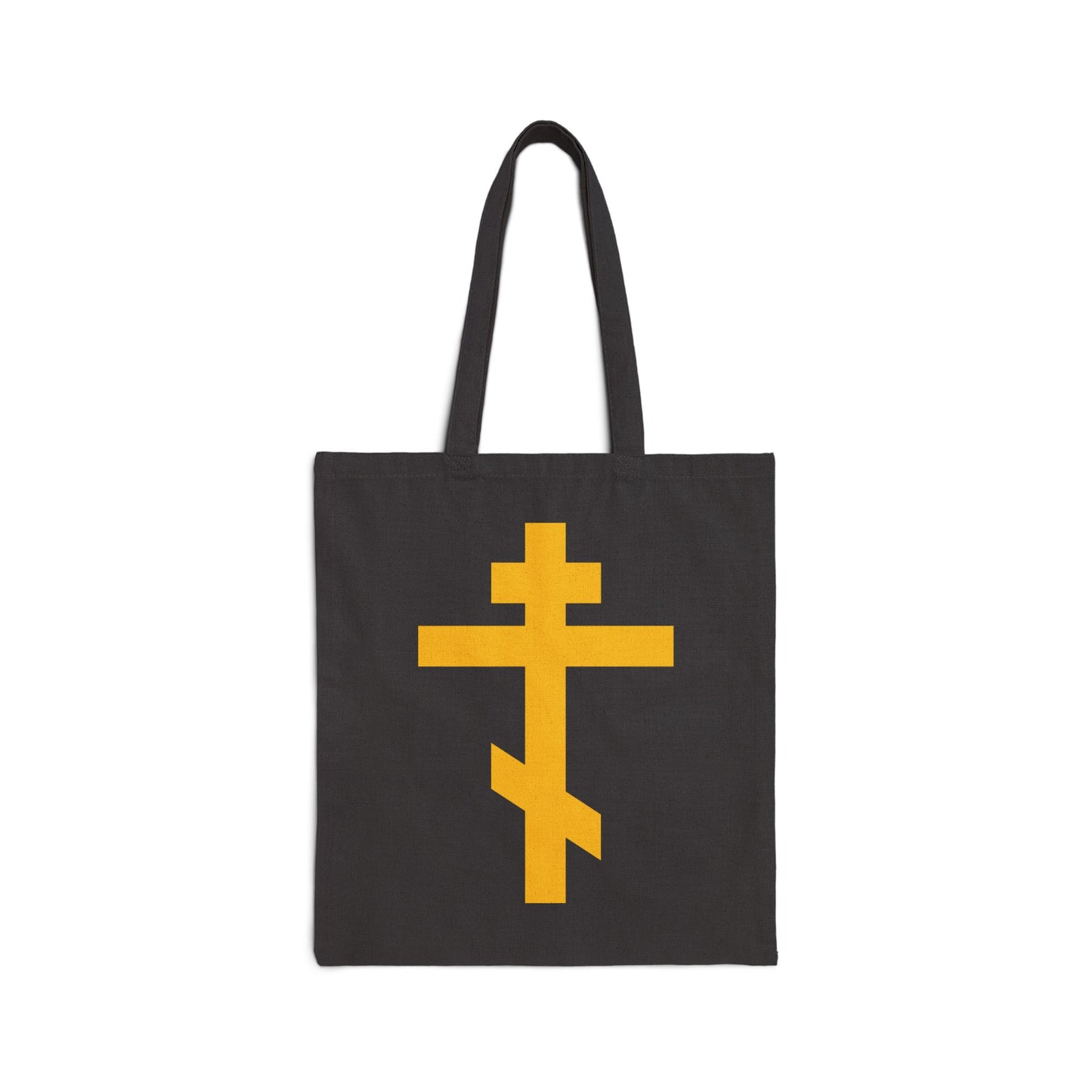 Black tote bag featuring a bold yellow Orthodox Cross, titled "Precious and Life-Giving Weapon of Unseen Warfare | Scourge of Demons," inspired by Galatians 2:20.
