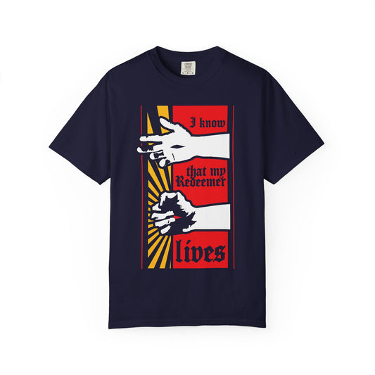 True Navy “I Know That My Redeemer Lives (Job 19:25)” heavyweight cotton unisex t-shirt featuring a Christ Resurrected comic book style graphic with two hands, sun rays, and the text “I know that my Redeemer lives” in red, white, and yellow—an inspiring design referencing Job 19:25-27 and the promise that one day we will see God.