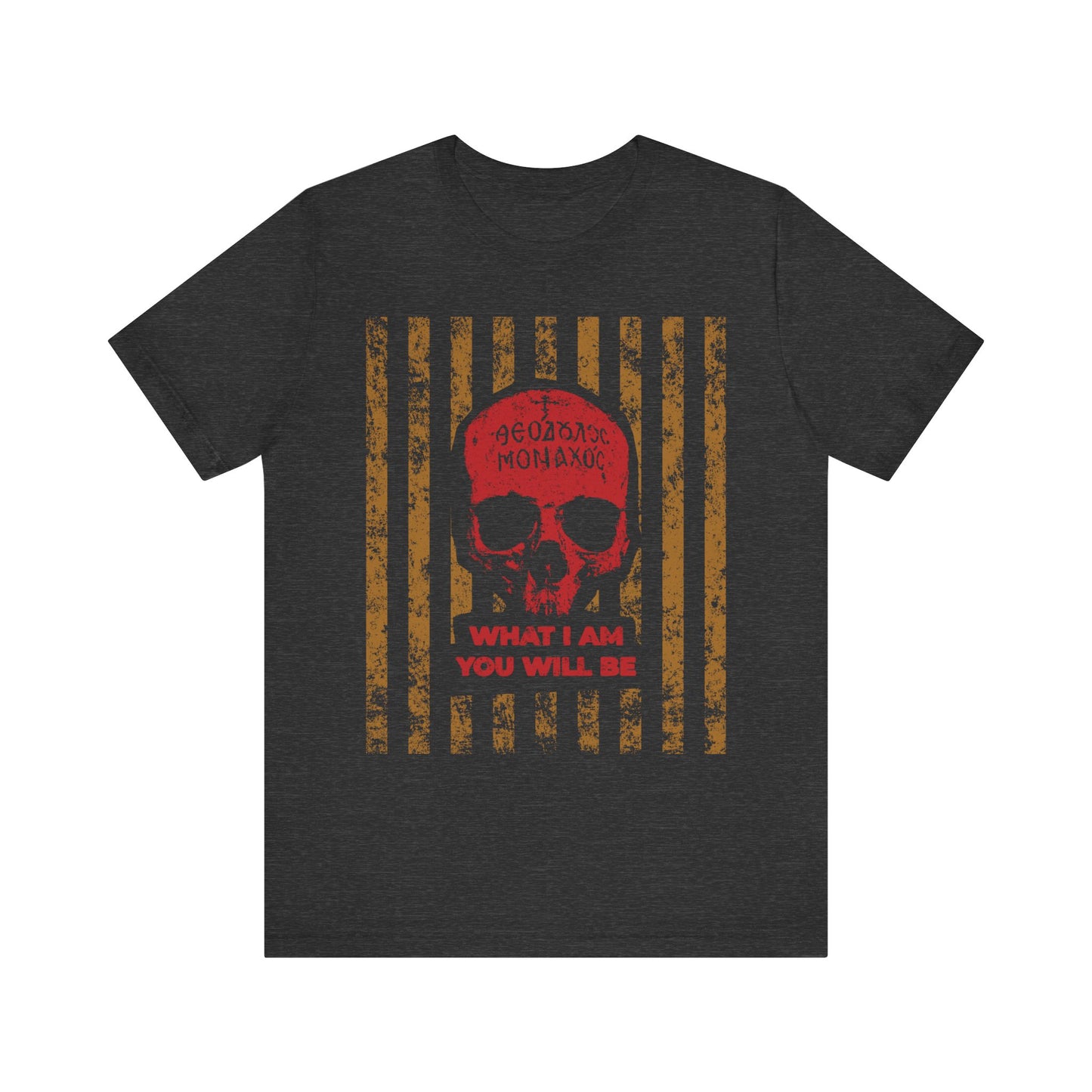 Dark Grey Heather t-shirt featuring a red skull, Greek text, and the phrase WHAT I AM YOU WILL BE over gold vertical bars—a striking design inspired by memento mori, the remembrance of death, and the teachings of St. Ignatius Brianchaninov on spiritual death.