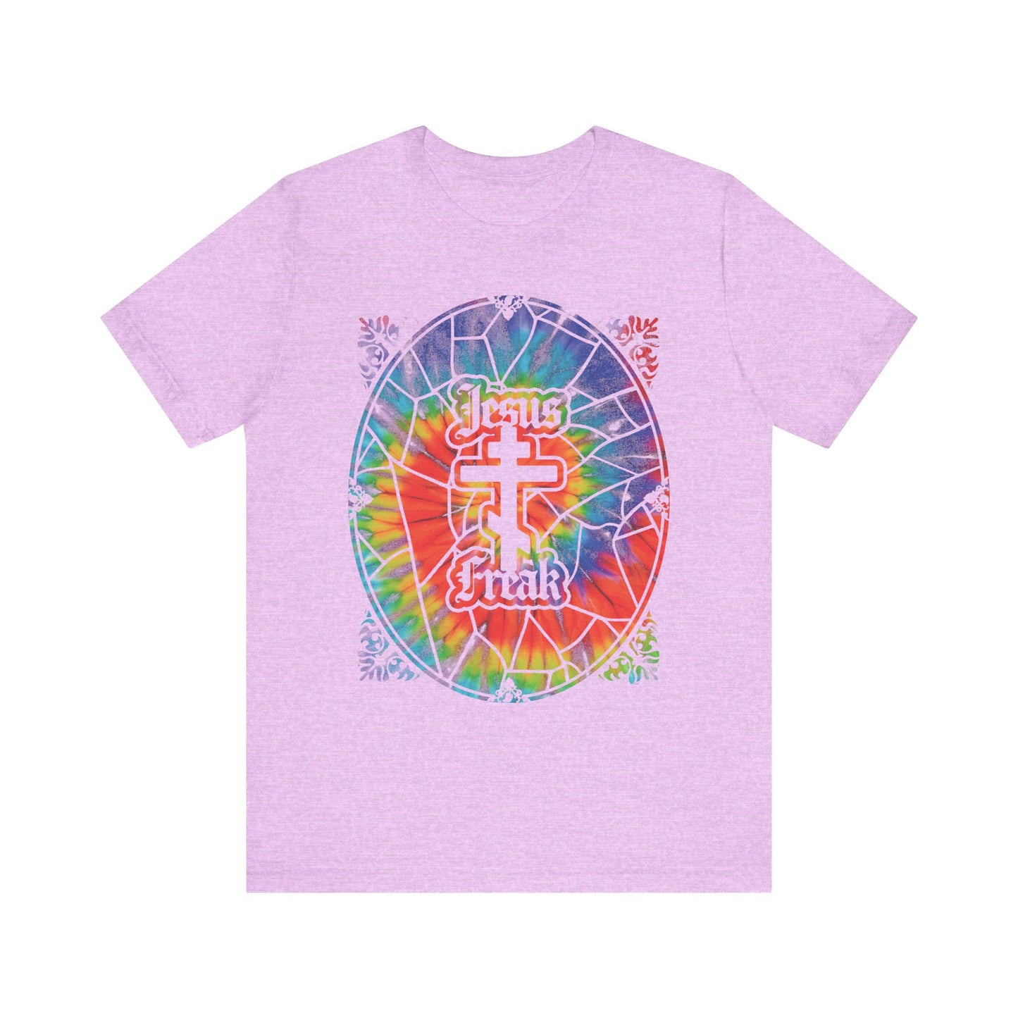 Heather Prism Lilac unisex cotton tee featuring a tie-dyed stained glass window design, Orthodox cross, and "Jesus Freak" lettering on the front—ideal for fans of the 70s Jesus Movement and inspired by bold hippie-era Christian style.