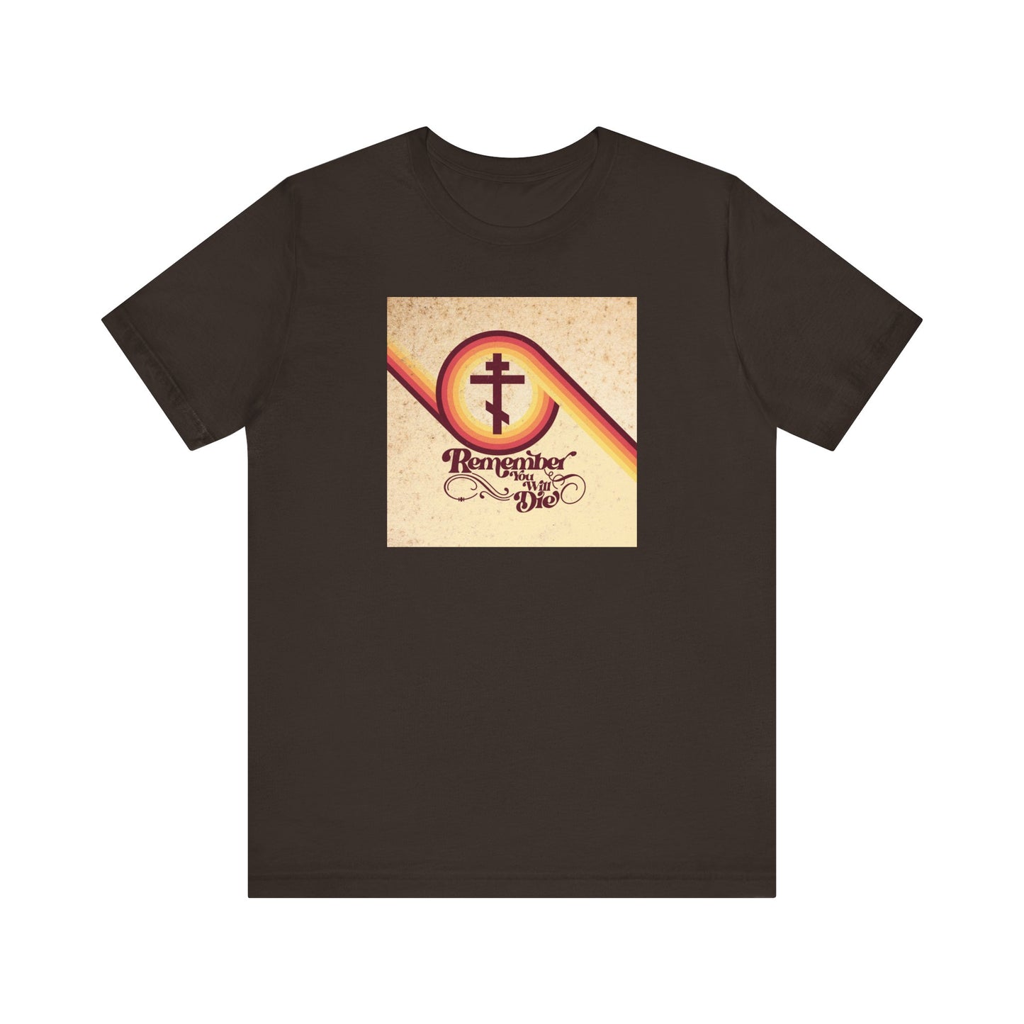 Brown lightweight cotton unisex tee featuring a 70s aesthetic graphic of a cross and the phrase "Remember You Will Die," inspired by the Orthodox Christian theme of memento mori and the parable of the rich fool (Luke 12:16-21).
