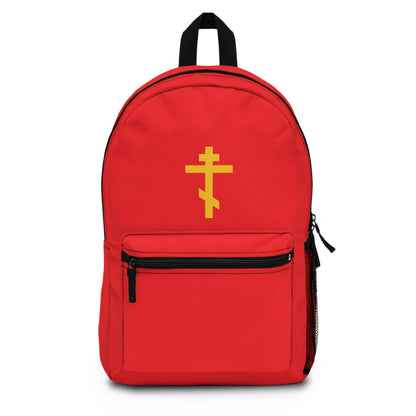 Orthodox Christian backpack featuring a yellow Orthodox cross on a red background—"Precious and Life-Giving Weapon of Unseen Warfare, Scourge of Demons." Inspired by the message of being crucified with Christ (Galatians 2:20).