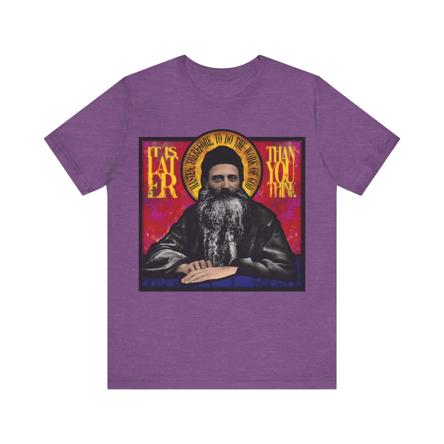 Heather Team Purple cotton t-shirt with stained glass design of Fr. Seraphim Rose and the phrase "It Is Later Than You Think," reminding us that salvation and the Kingdom of Heaven may be nearer than we think.