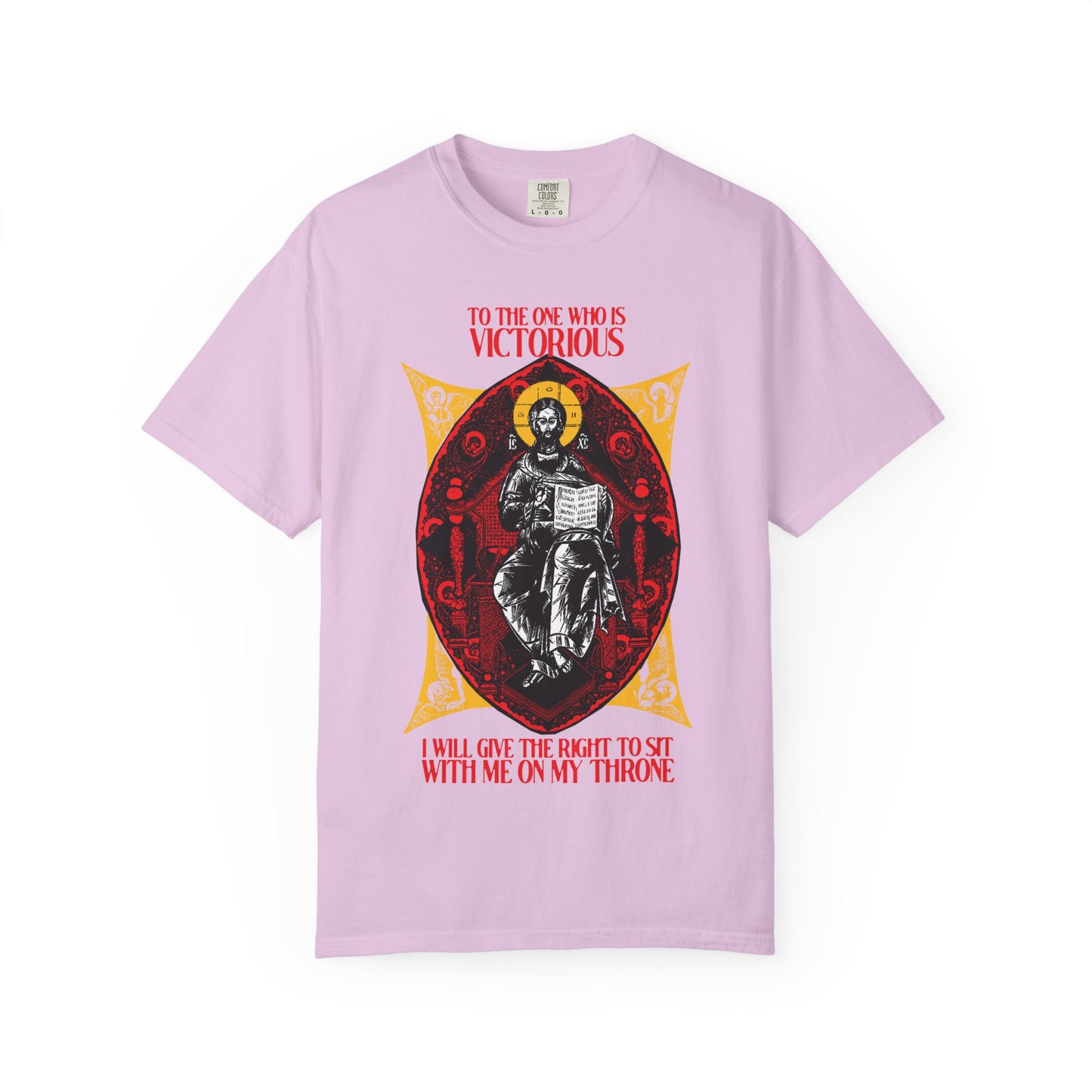 Orchid "Christ is King, Enthroned In Glory IconoGraphic" heavyweight tee features red "To the One Who Is Victorious…" text and religious artwork, inspired by Revelation 3:21 and the promise to reign with Christ.