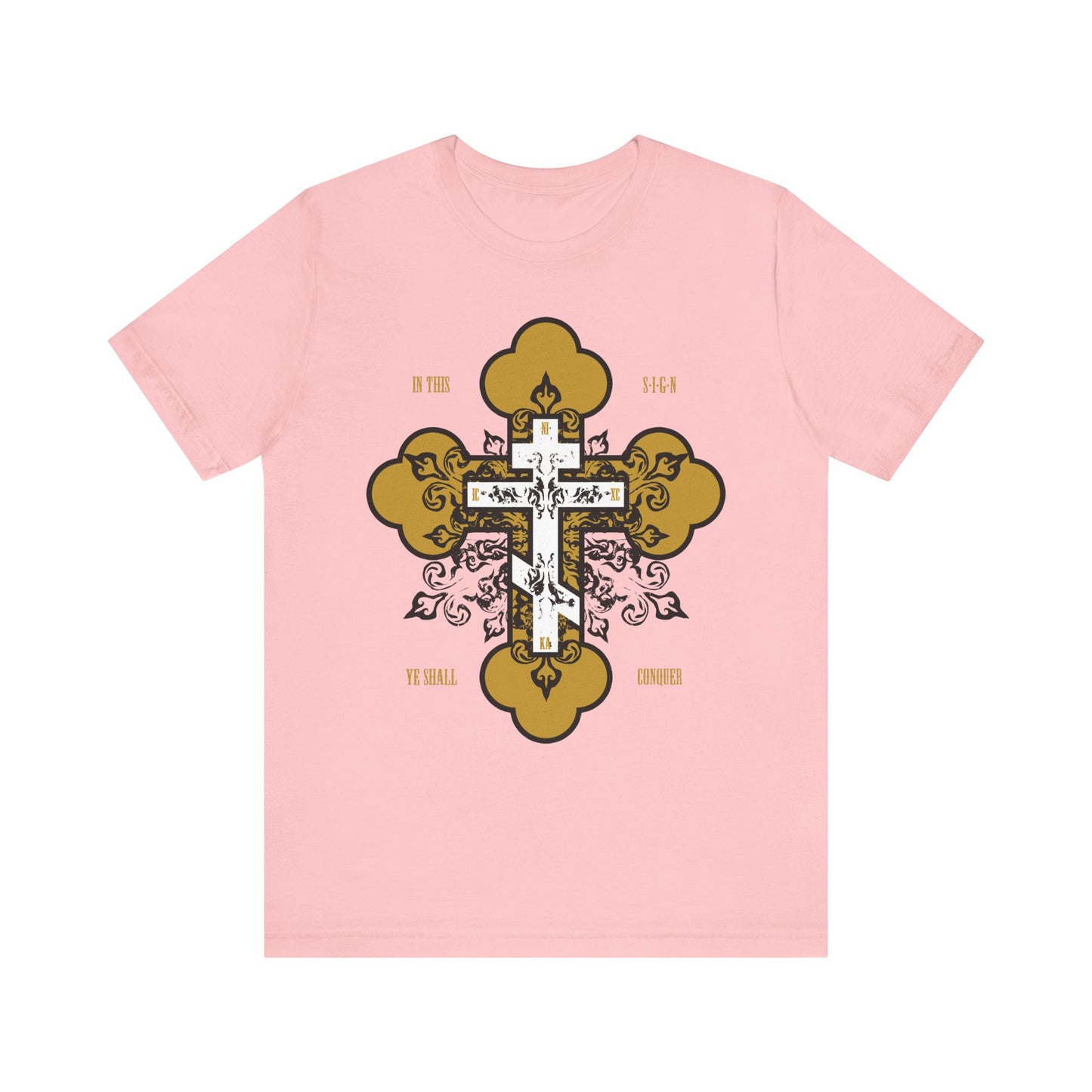 Pink “In This Sign Ye Shall Conquer” tee features a gold & white Orthodox ornate cross with floral accents and “In Hoc Signo Vinces,” blending faith-inspired design and lightweight cotton comfort.